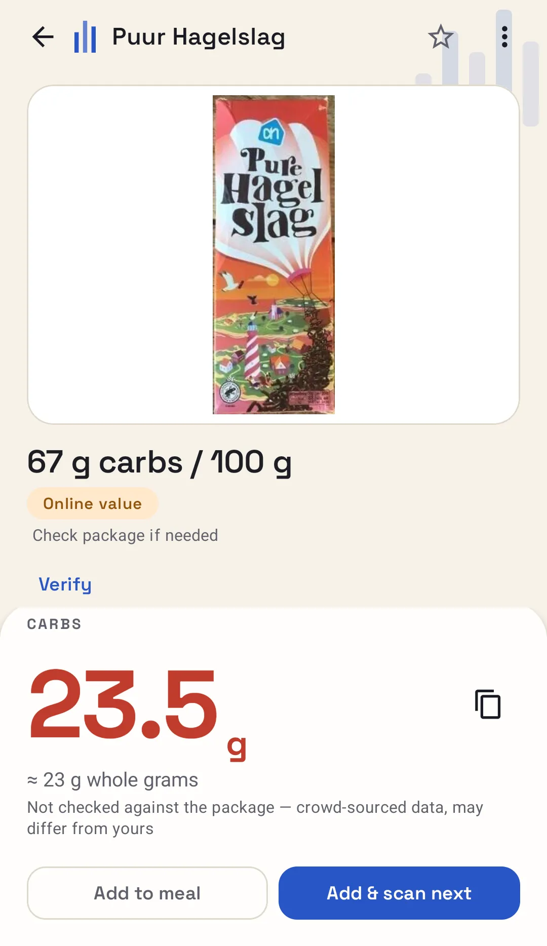 Just the Carbs result screen for a chocolate sprinkle product with 67 g carbs per 100 g. For a 35 g portion the answer reads 23.5 g carbs, about 23 g whole grams.